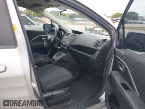 2013 Mazda 5 Touring with VIN JM1CW2CL5D0160104, listed as a IAAI auction lot 41722470 with 135,708 mi miles. Bid and sale history available at carsss.com. Image 5.