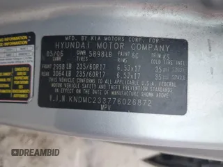 2007 Hyundai Entourage GLS z VIN KNDMC233776026872, wystawiony jako Copart lot #50650865 z przebiegiem 235 202 mil mil oraz Szkoda całkowita • Salvage title. Historia ofert i sprzedaży dostępna na DreamBid. Obrazek 13.