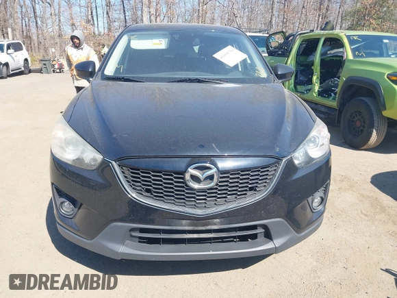 2014 Mazda CX-5 Grand Touring with VIN JM3KE4DY1E0339690, listed as a IAAI auction lot 41668780 with 216,825 mi miles. Bid and sale history available at carsss.com. Image 12.
