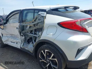 2018 Toyota C-HR XLE z VIN NMTKHMBX2JR026180, wystawiony jako IAAI lot #42156129 z przebiegiem 77 795 mil mil oraz . Historia ofert i sprzedaży dostępna na DreamBid. Obrazek 6.