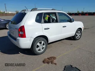 2006 Hyundai Tucson GL with VIN KM8JM72B56U324168, listed as a IAAI auction lot 42146955 with 206,919 mi miles. Bid and sale history available at carsss.com. Image 4.