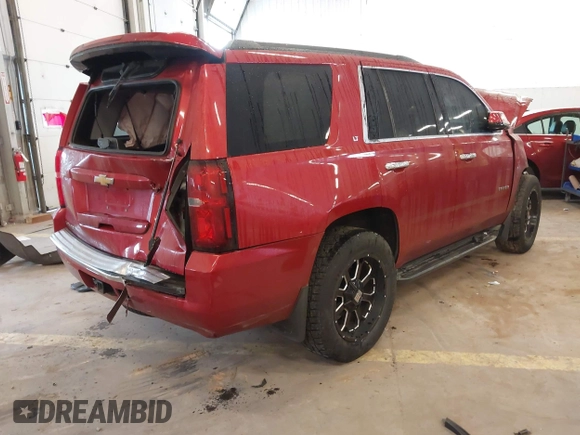 2015 Chevrolet Tahoe LT with VIN 1GNSKBKC9FR224692, listed as a IAAI auction lot 41922047 with 138,816 mi miles and . Bid and sale history available at DreamBid. Image 4.