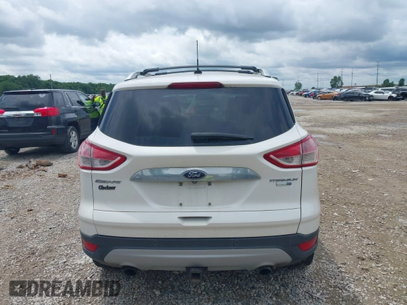 2016 Ford Escape Titanium z VIN 1FMCU9J90GUC76504, wystawiony jako IAAI lot #42552851 z przebiegiem 89 570 mil mil oraz . Historia ofert i sprzedaży dostępna na DreamBid. Obrazek 17.