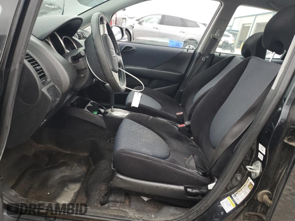 2008 Honda Fit with VIN JHMGD384X8S068090, listed as a Copart auction lot 61133985 with 177,729 mi miles and Clean title. Bid and sale history available at DreamBid. Image 7.