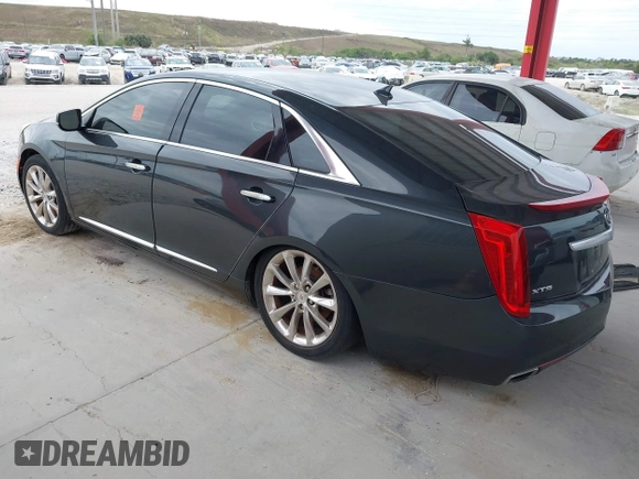 2014 Cadillac XTS Luxury with VIN 2G61M5S33E9217619, listed as a IAAI auction lot 41343003 with 126,303 mi miles. Bid and sale history available at carsss.com. Image 3.