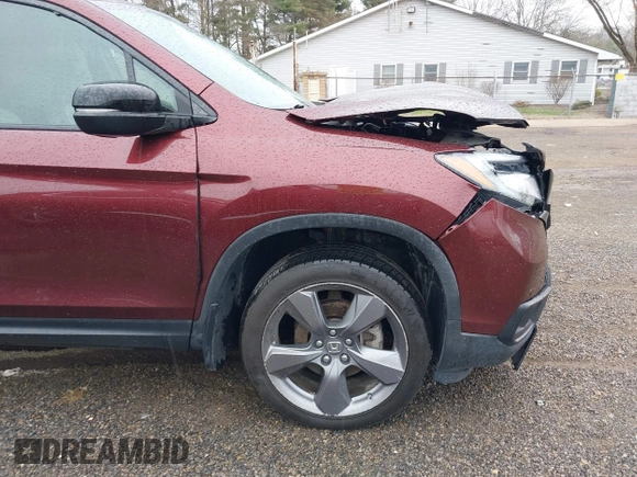 2019 Honda Passport Touring z VIN 5FNYF8H99KB005625, wystawiony jako IAAI lot #41905030 z przebiegiem 64 998 mil mil oraz . Historia ofert i sprzedaży dostępna na DreamBid. Obrazek 19.