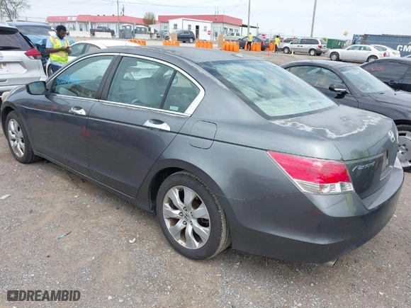 2009 Honda Accord Sdn EX-L with VIN 5KBCP36899B502691, listed as a IAAI auction lot 42036521 with 215,574 mi miles. Bid and sale history available at carsss.com. Image 3.