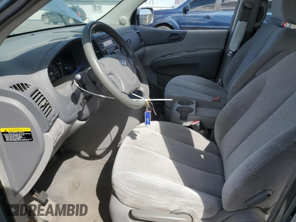2007 Kia Sedona LX with VIN KNDMB233776175608, listed as a Copart auction lot 69321964 with 198,560 mi miles and Salvage Title. Bid and sale history available at carsss.com. Image 7.