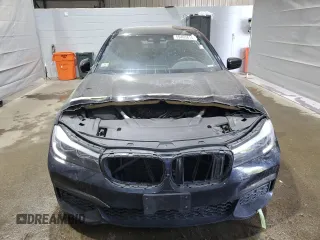2019 BMW 7 Series 740i xDrive with VIN WBA7E4C58KGV70026, listed as a Copart auction lot 59465615 with Not provided miles and Salvage title. Bid and sale history available at DreamBid. Image 5.