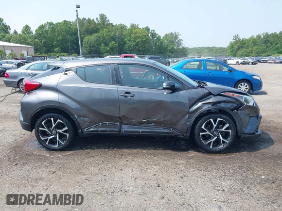 2018 Toyota C-HR XLE with VIN NMTKHMBX0JR008776, listed as a IAAI auction lot 42472338 with 48,910 mi miles and . Bid and sale history available at DreamBid. Image 13.