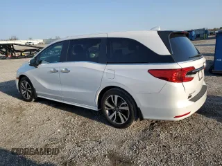 2024 Honda Odyssey Touring z VIN 5FNRL6H82RB039313, wystawiony jako Copart lot #52632005 z przebiegiem 18 447 mil mil oraz Szkoda całkowita • Salvage title. Historia ofert i sprzedaży dostępna na DreamBid. Obrazek 2.
