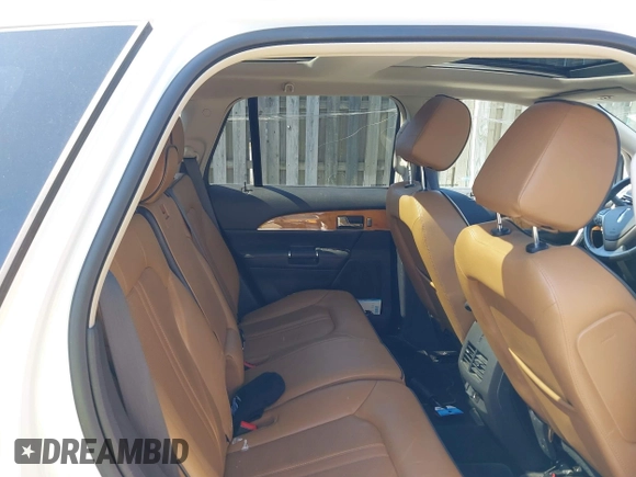 2013 Lincoln MKX with VIN 2LMDJ8JK7DBL13659, listed as a IAAI auction lot 41922667 with 113,858 mi miles. Bid and sale history available at carsss.com. Image 7.