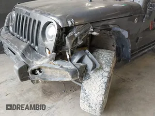 2017 Jeep Wrangler Unlimited Sahara with VIN 1C4BJWEG8HL638067, listed as a IAAI auction lot 41274352 with 57,339 mi miles. Bid and sale history available at carsss.com. Image 6.