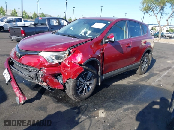2018 Toyota RAV4 XLE with VIN JTMWFREV6JD117500, listed as a IAAI auction lot 42258588 with Not provided miles and . Bid and sale history available at DreamBid. Image 18.
