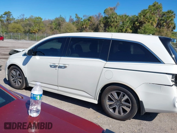 2015 Honda Odyssey Touring Elite with VIN 5FNRL5H96FB090702, listed as a IAAI auction lot 41825889 with 118,157 mi miles and . Bid and sale history available at DreamBid. Image 15.