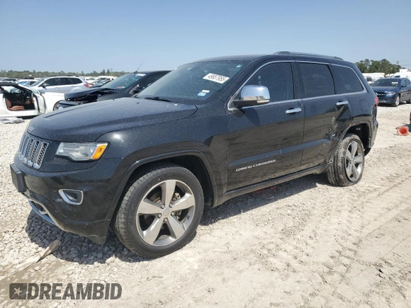 2015 Jeep Grand Cherokee High Altitude with VIN 1C4RJECGXFC906464, listed as a Copart auction lot 49657955 with 125,239 mi miles and Salvage Title. Bid and sale history available at carsss.com. Image 1.