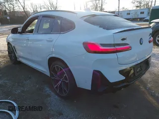 2022 BMW X4 M with VIN 5YM23EC00N9L88771, listed as a IAAI auction lot 41362198 with 29,949 mi miles. Bid and sale history available at carsss.com. Image 3.