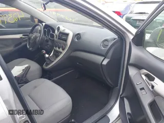 2009 Toyota Matrix S z VIN 2T1KE40E89C020335, wystawiony jako IAAI lot #42399155 z przebiegiem 71 085 mil mil oraz . Historia ofert i sprzedaży dostępna na DreamBid. Obrazek 5.