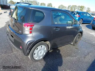 2014 Scion iQ with VIN JTNJJXB00EJ030409, listed as a IAAI auction lot 41352980 with 176,739 mi miles. Bid and sale history available at carsss.com. Image 4.