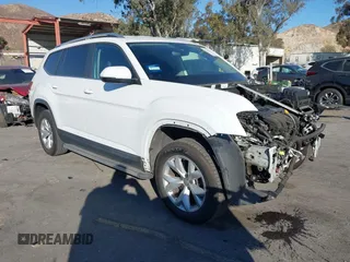 2018 Volkswagen Atlas SE with VIN 1V2DR2CA9JC551484, listed as a IAAI auction lot 41262713 with 59,054 mi miles and . Bid and sale history available at DreamBid. Image 1.