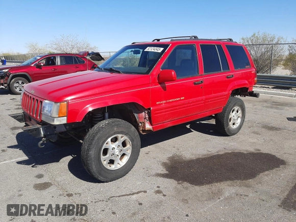 1996 Jeep Grand Cherokee Limited with VIN 1J4GZ78Y0TC376265, listed as a Copart auction lot 52124345 with 205,676 mi miles and Salvage Title. Bid and sale history available at carsss.com. Image 1.