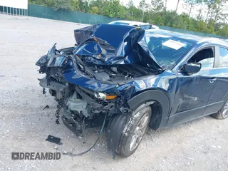 2022 Mazda CX-30 S Select with VIN 3MVDMBBL6NM448268, listed as a IAAI auction lot 42242290 with Not provided miles and . Bid and sale history available at DreamBid. Image 6.