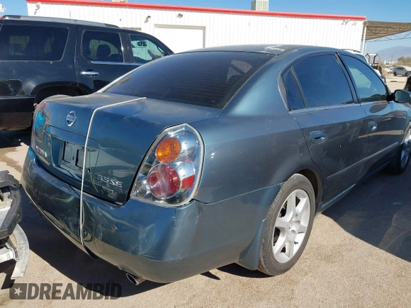 2002 Nissan Altima SE with VIN 1N4BL11D72C700998, listed as a IAAI auction lot 41369017 with 117,148 mi miles. Bid and sale history available at carsss.com. Image 6.