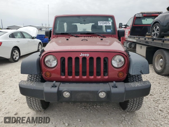 2012 Jeep Wrangler Unlimited Sport with VIN 1C4BJWDG5CL158739, listed as a Copart auction lot 51334975 with 31,818 mi miles and Salvage Title. Bid and sale history available at carsss.com. Image 5.