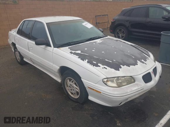1998 Pontiac Grand Am SE2 with VIN 1G2NE52T7WM513702, listed as a IAAI auction lot 41503141 with 302,315 mi miles. Bid and sale history available at carsss.com. Image 1.