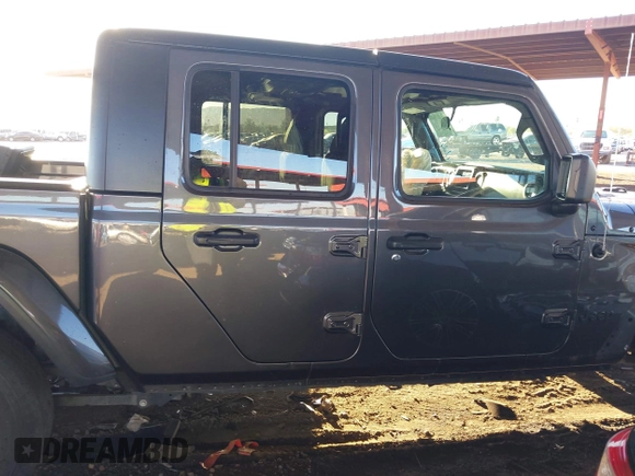 2021 Jeep Gladiator Willys with VIN 1C6HJTAG2ML507426, listed as a IAAI auction lot 41407608 with 49,554 mi miles and . Bid and sale history available at carsss.com. Image 14.
