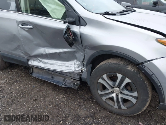 2018 Toyota RAV4 LE with VIN JTMBFREV8JJ200930, listed as a IAAI auction lot 42524876 with 88,015 mi miles and . Bid and sale history available at DreamBid. Image 6.