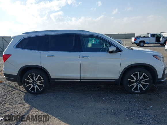 2022 Honda Pilot Touring 7-Passenger with VIN 5FNYF6H67NB017660, listed as a IAAI auction lot 41194603 with 87,301 mi miles. Bid and sale history available at carsss.com. Image 13.