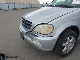 2003 Mercedes-Benz M-Class with VIN 4JGAB75E33A378920, listed as a IAAI auction lot 41914065 with 232,968 mi miles. Bid and sale history available at carsss.com. Image 13.