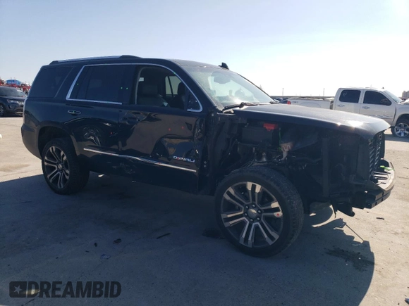 2017 GMC Yukon Denali with VIN 1GKS1CKJ5HR363368, listed as a Copart auction lot 46167715 with 134,515 mi miles and Salvage Title. Bid and sale history available at carsss.com. Image 4.