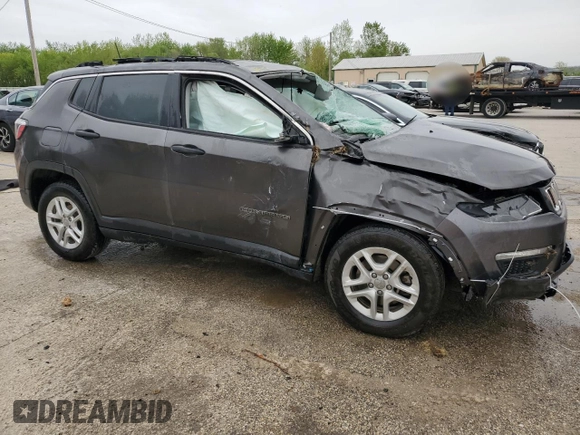 2019 Jeep Compass Sport with VIN 3C4NJCAB1KT847992, listed as a Copart auction lot 54329705 with 101,303 mi miles and Salvage title. Bid and sale history available at DreamBid. Image 4.