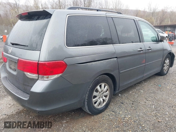 2009 Honda Odyssey EX-L with VIN 5FNRL38709B413309, listed as a IAAI auction lot 41923350 with 252,482 mi miles. Bid and sale history available at carsss.com. Image 4.