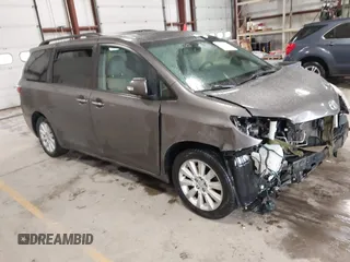 2015 Toyota Sienna Ltd with VIN 5TDDK3DC3FS106157, listed as a IAAI auction lot 41737202 with 173,724 mi miles. Bid and sale history available at carsss.com. Image 1.