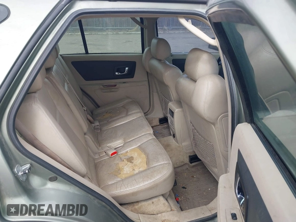 2004 Cadillac SRX with VIN 1GYDE63A340128713, listed as a IAAI auction lot 41788552 with 158,606 mi miles. Bid and sale history available at carsss.com. Image 8.
