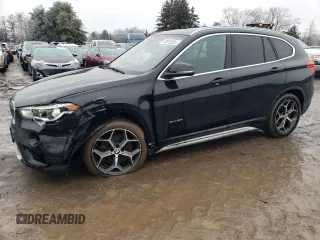 2017 BMW X1 xDrive28i with VIN WBXHT3Z35H4A57765, listed as a Copart auction lot 43913535 with 139,212 mi miles and Salvage Title. Bid and sale history available at carsss.com. Image 1.