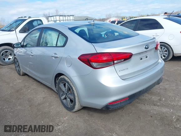 2018 Kia Forte LX with VIN 3KPFL4A77JE274020, listed as a IAAI auction lot 41919650 with 94,568 mi miles and . Bid and sale history available at DreamBid. Image 3.