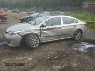 2014 Toyota Avalon Limited z VIN 4T1BK1EB7EU079438, wystawiony jako Copart lot #56710265 z przebiegiem 132 762 mil mil oraz Szkoda całkowita • Salvage title. Historia ofert i sprzedaży dostępna na DreamBid. Obrazek 1.