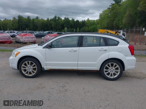 2011 Dodge Caliber Heat z VIN 1B3CB5HA5BD186441, wystawiony jako IAAI lot #42309221 z przebiegiem 166 026 mil mil oraz . Historia ofert i sprzedaży dostępna na DreamBid. Obrazek 12.
