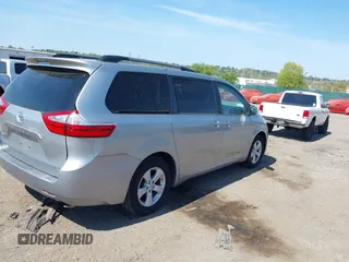 2015 Toyota Sienna LE AAS with VIN 5TDKK3DC5FS642583, listed as a IAAI auction lot 42110445 with 61,668 mi miles. Bid and sale history available at carsss.com. Image 4.
