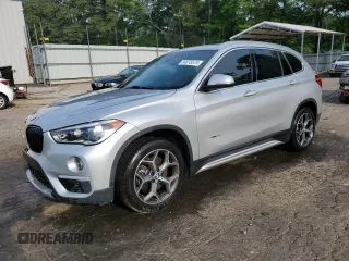 2017 BMW X1 xDrive28i z VIN WBXHT3Z34H4A53786, wystawiony jako Copart lot #54678575 z przebiegiem 86 312 mil mil oraz Szkoda całkowita • Salvage title. Historia ofert i sprzedaży dostępna na DreamBid. Obrazek 1.