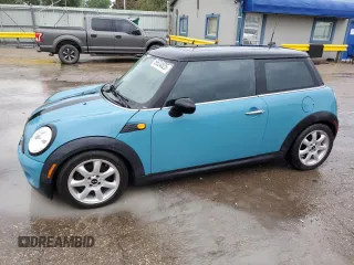2009 MINI Hardtop with VIN WMWMF33539TT69470, listed as a Copart auction lot 59624825 with 132,959 mi miles and Salvage title. Bid and sale history available at DreamBid. Image 1.
