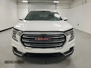 2023 GMC Terrain SLT z VIN 3GKALPEG2PL188824, wystawiony jako Copart lot #64419865 z przebiegiem 69 644 mil mil oraz Czysty tytuł • Clean title. Historia ofert i sprzedaży dostępna na DreamBid. Obrazek 5.