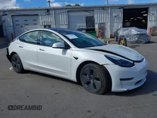 2022 Tesla Model 3 with VIN 5YJ3E1EA4NF169940, listed as a IAAI auction lot 41741606 with 26,075 mi miles. Bid and sale history available at carsss.com. Image 1.