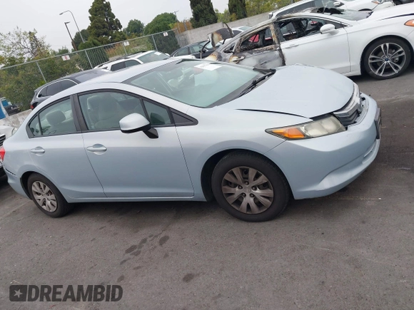 2012 Honda Civic LX with VIN 2HGFB2F58CH560126, listed as a IAAI auction lot 42097094 with 149,921 mi miles and . Bid and sale history available at DreamBid. Image 13.