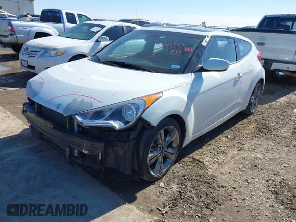 2016 Hyundai Veloster z VIN KMHTC6AD3GU267365, wystawiony jako IAAI lot #41469796 z przebiegiem 111 791 mil mil oraz . Historia ofert i sprzedaży dostępna na DreamBid. Obrazek 2.