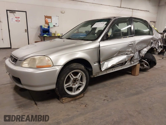 1996 Honda Civic EX with VIN 1HGEJ864XTL053613, listed as a IAAI auction lot 41717526 with 247,022 mi miles. Bid and sale history available at carsss.com. Image 2.